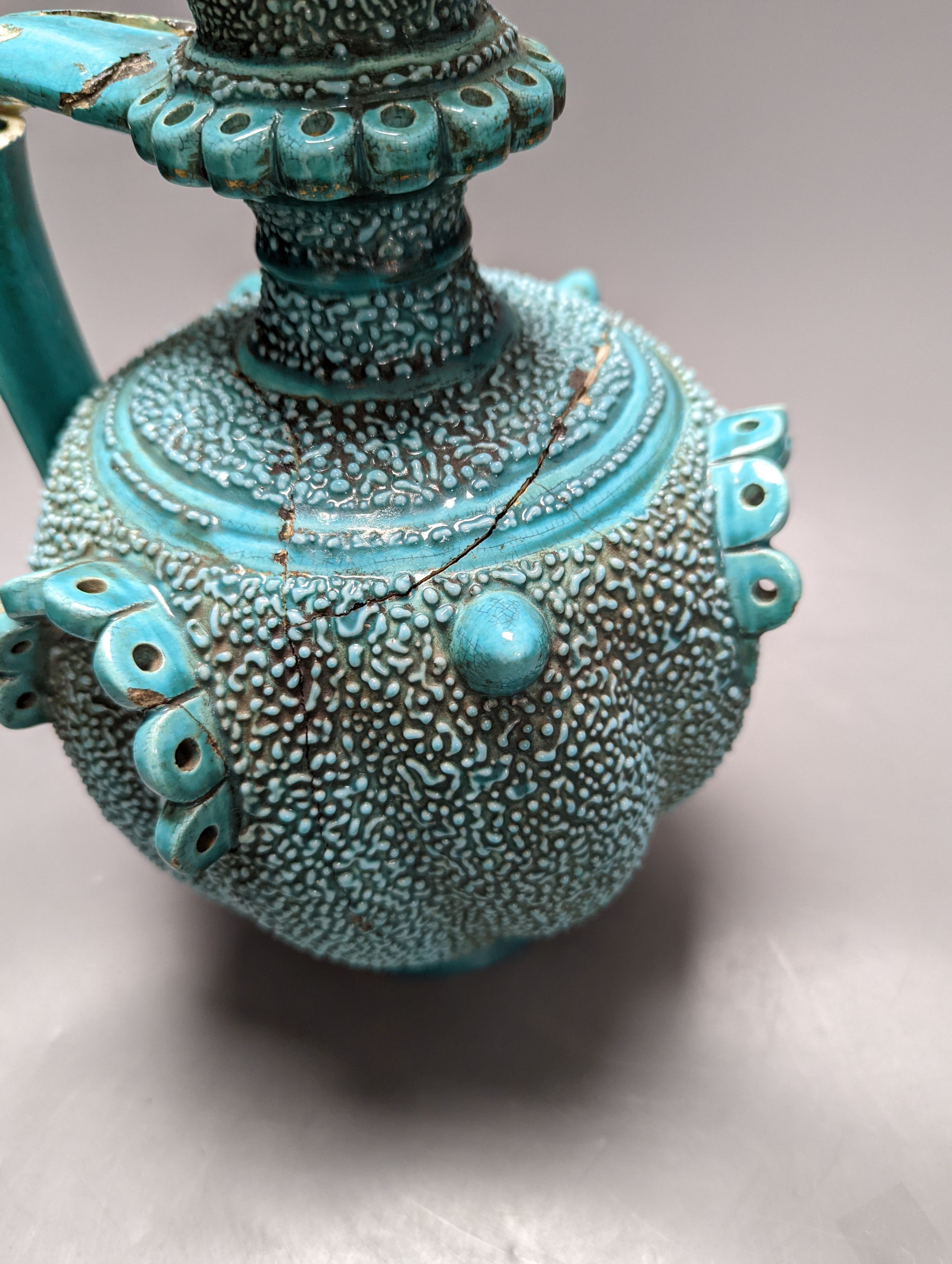 A Zsolnay turquoise glazed ewer (a.f.) 30cm